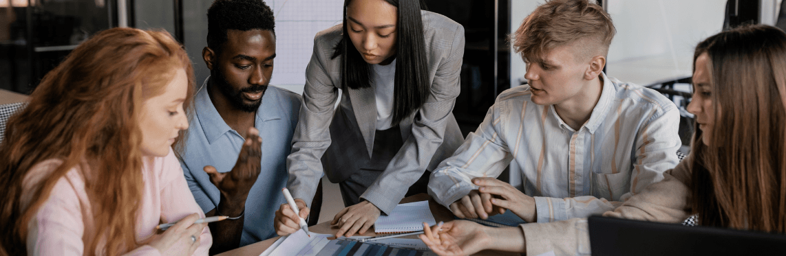 Featured image of a diverse workplace with multi-ethnic employees in an office.